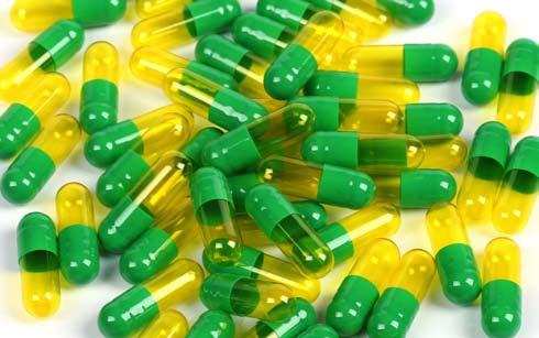 Green and yellow empty hard capsules