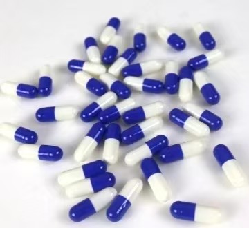 Blue and white empty capsules
